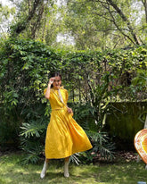 Silk midi dress with puff sleeves, button front detail and gathered tiered skirt